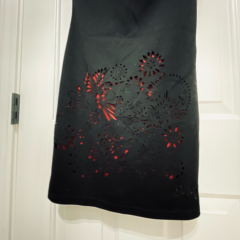 Gorgeous desigual little black dress with laser cutouts showing burgundy lining